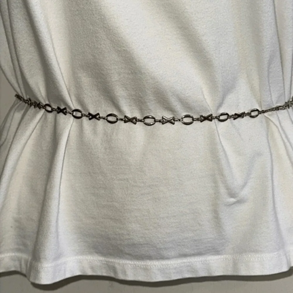 Gold tone XOXO thin metal chain belt